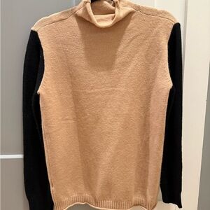 Woman’s Tan and Black Sweater